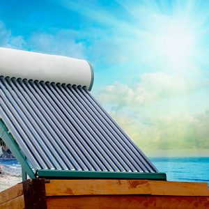 Solar heater for green energy on the background of sun and clouds